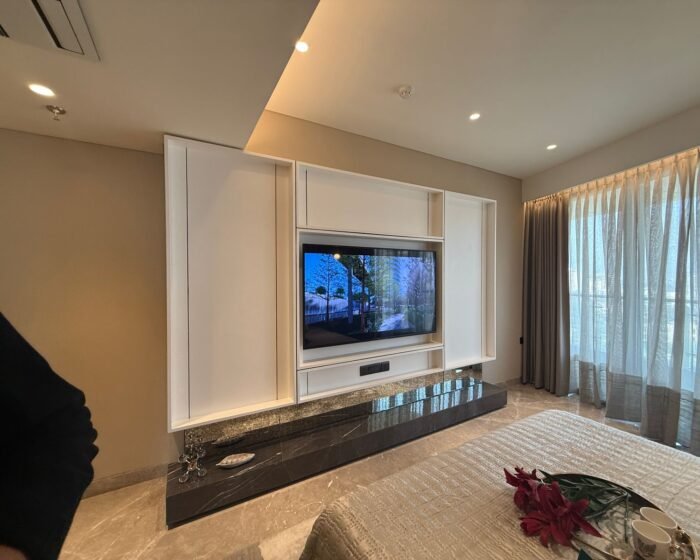 "Luxury TV panel with premium finish by DSI Interior"